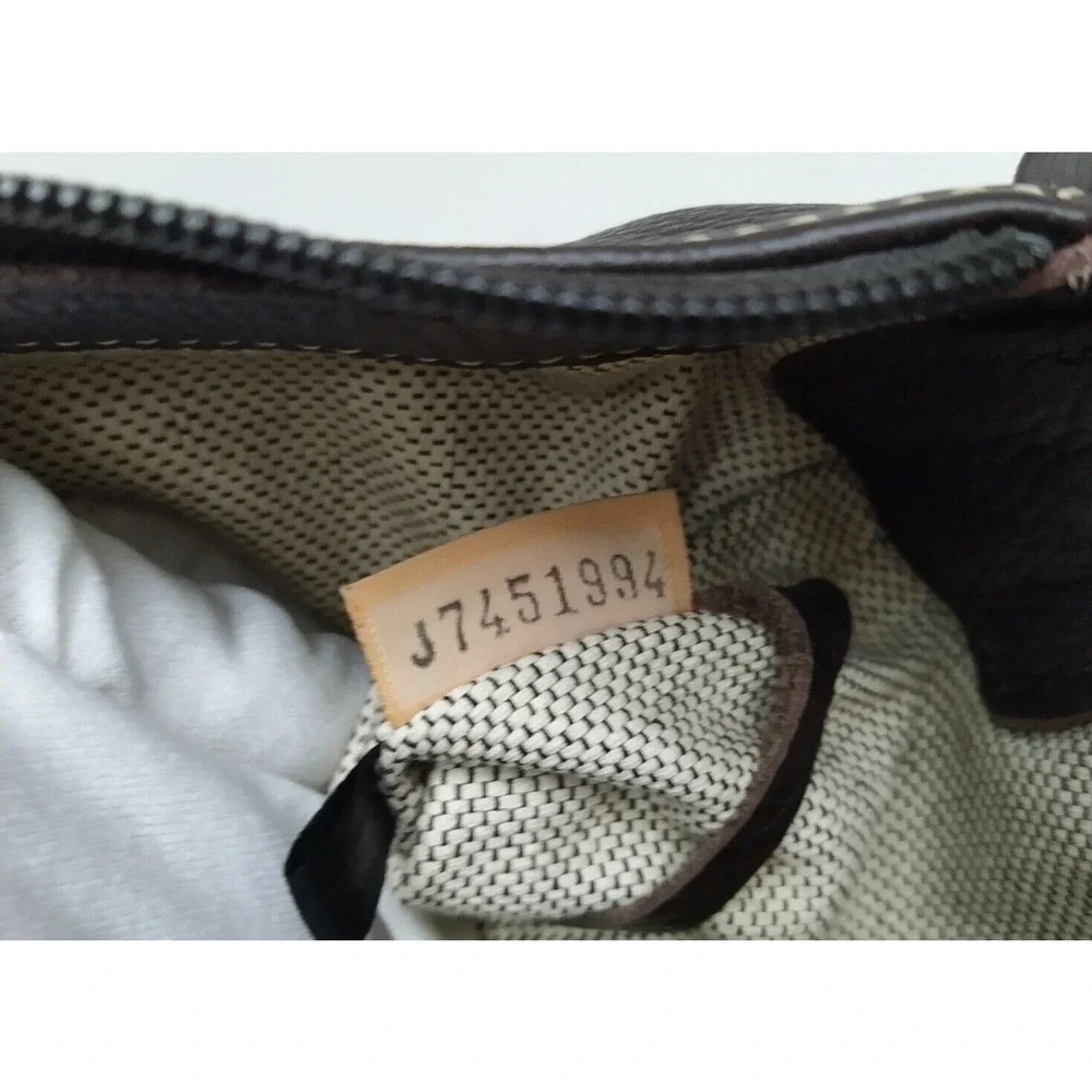 Dooney & Bourke Brown Pebbled Leather Round Logo Zipper Hobo Shoulder Bag